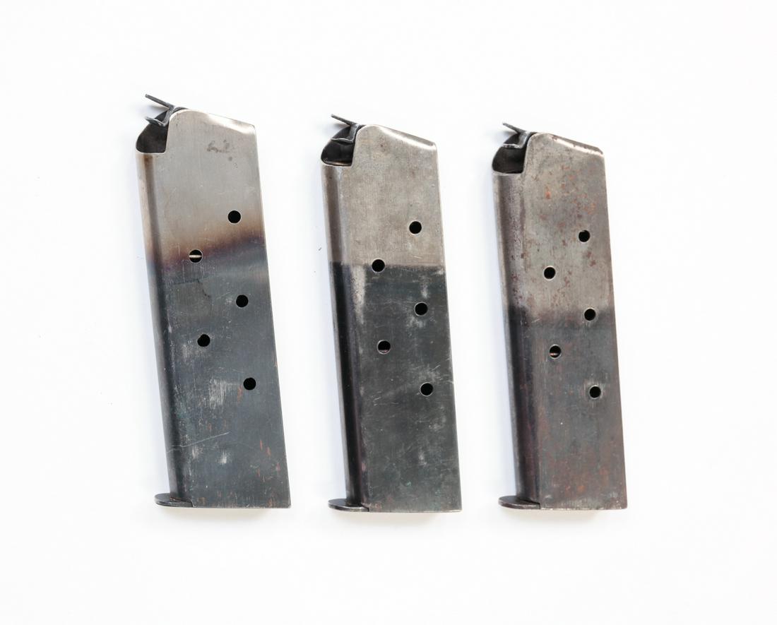 THREE 2 TONE COLT MODEL 1911 .45 MAGAZINES: Three Colt Model 1911 magazines. Two tone magazines in good, original condition.