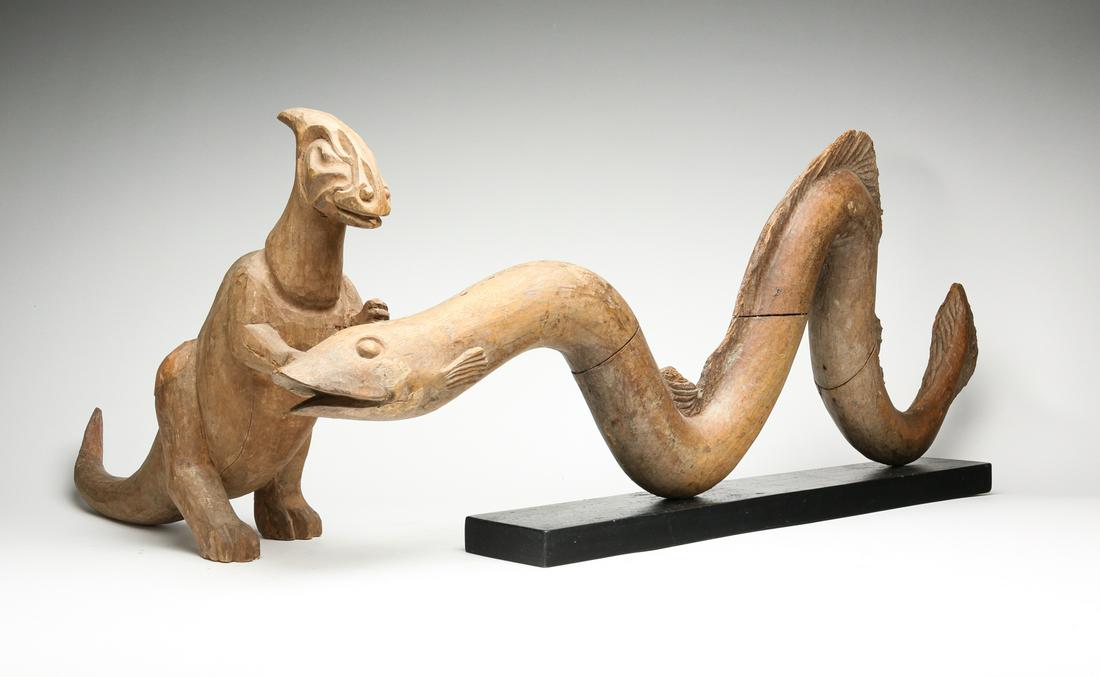TWO WOODEN MOLDS OF DINOSAUR AND SERPENT. (1 of 5)