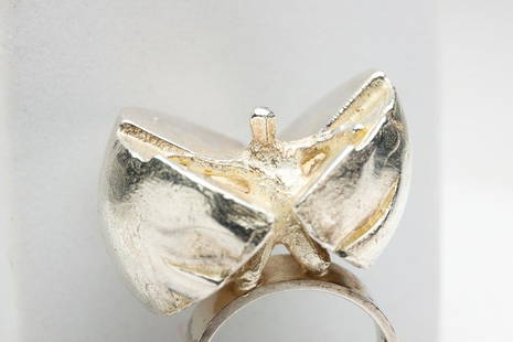 FINNISH SILVER LAPPONIA FIGURAL RING.: Finland, 4th Qtr - 20th century. Ring by Björn Weckström, (Finnish, b.1935), Marks: trident symbol for Lapponia, 925 H, STERLING, Q7, FINLAND ring size 7, weight 21gr.