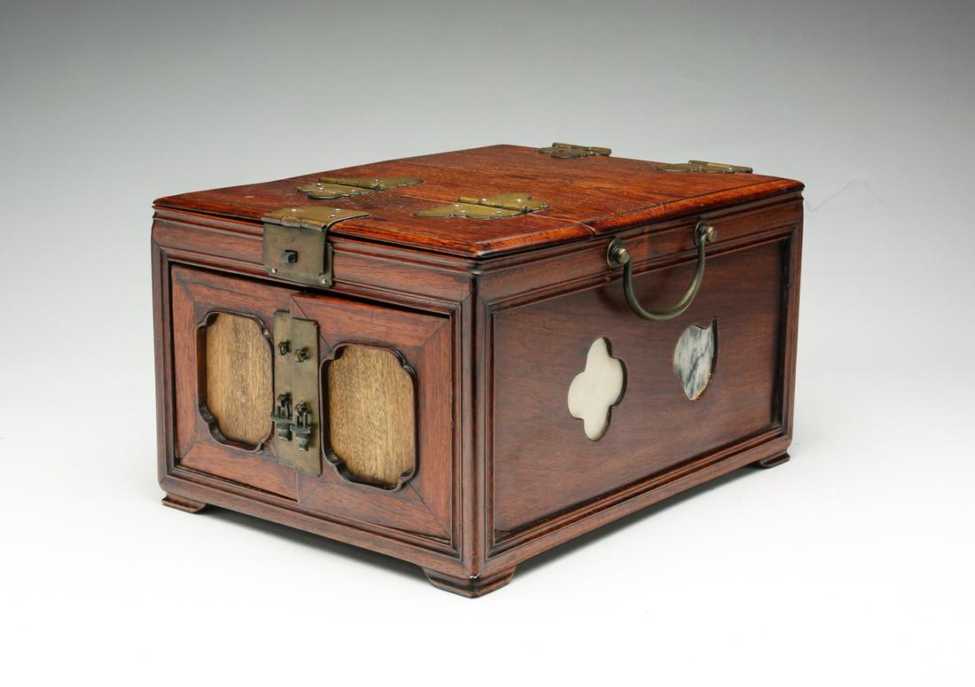 CHINESE TRAVELING JEWELRY BOX.: Late 19th century, probably rosewood. Molded edges and feet, brass hardware. Lift top with interior beveled edge mirror, retractable doors and three drawers with back dovetails. Refinished. Case, 6"h.
