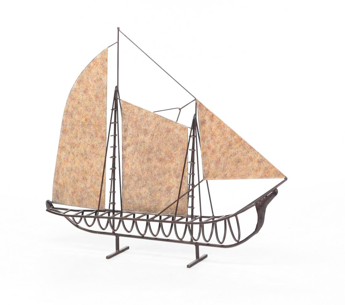 METAL MODEL OF A SAILING SHIP.: Late 20th century. Tubular steel hull and sheet metal sails. 32"h. 36"l.