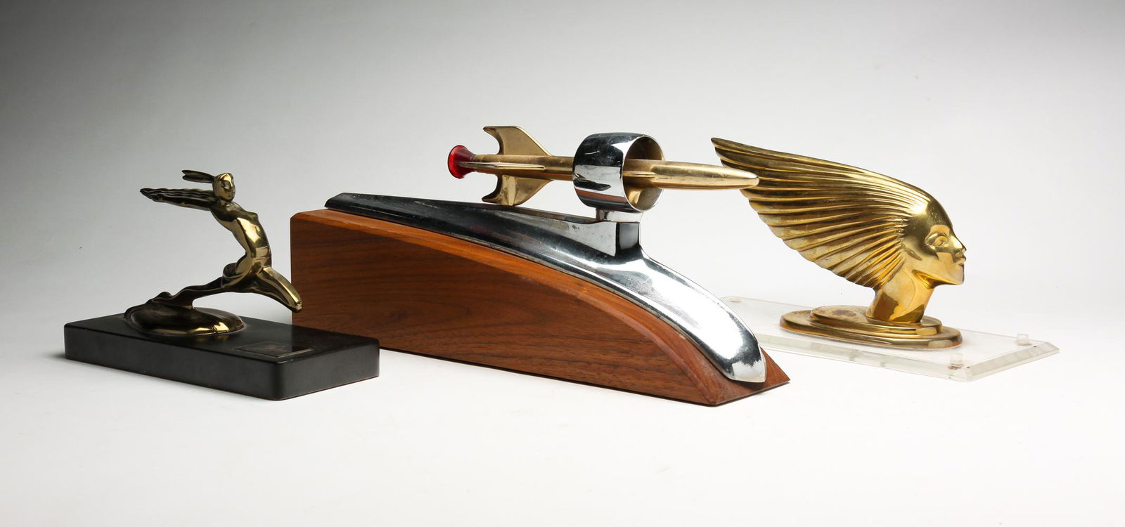 THREE AUTOMOBILE HOOD ORNAMENTS. (1 of 7)