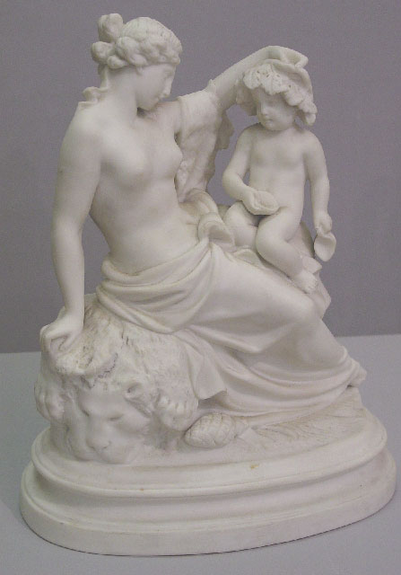 PARIAN FIGURE GROUP. Maenad seated on a