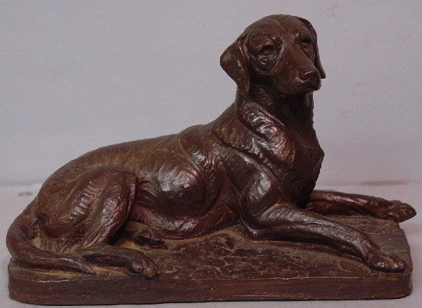 BRONZE DOG STATUE. Reclining Lab with an: BRONZE DOG STATUE. Reclining Lab with an alert face. Signed "Doris Lindner" (British, d. 1930). 8 1/2"l. 5 1/2"h.