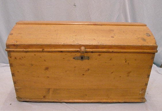 PINE DOME TOP TRUNK. Dovetailed case an: PINE DOME TOP TRUNK. Dovetailed case and iron handles. 35"w. 21"d. 21"h.