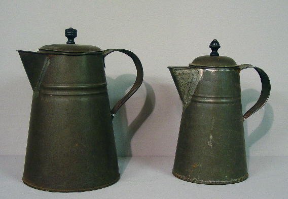TWO SIMILAR TIN COFFEE POTS. Tapered for