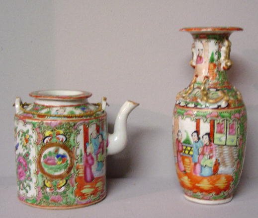 TWO PIECES OF ROSE MEDALLION. Small teap: TWO PIECES OF ROSE MEDALLION. Small teapot with a lid and double wire bale handle. 5"h. And a small vase with two large decorated panels and applied gilt serpents on the shoulder and neck. 8 1/4"h.