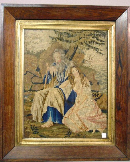 FRAMED NEEDLEWORK PANEL. Wool thread in varying st: FRAMED NEEDLEWORK PANEL. Wool thread in varying stitches showing a man and woman with harps under a pine tree. Soft shades with deep blue. Rosewood veneer frame with gilt liner (wear). 26"h. 21 1/2"w.