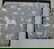 451: TABLE COVER. White cotton cross-stitch on blue an