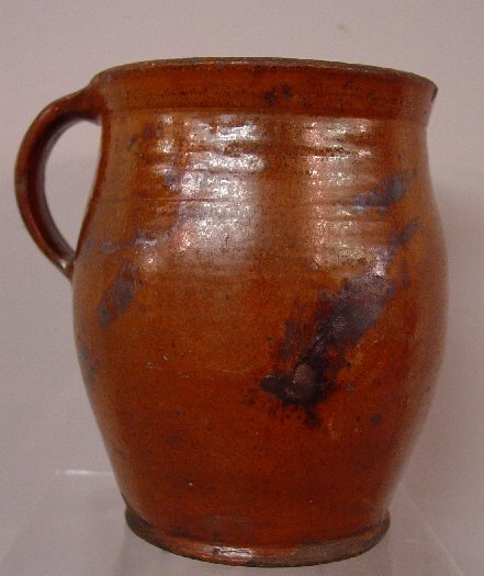 REDWARE JAR. Ovoid with a flared rim and