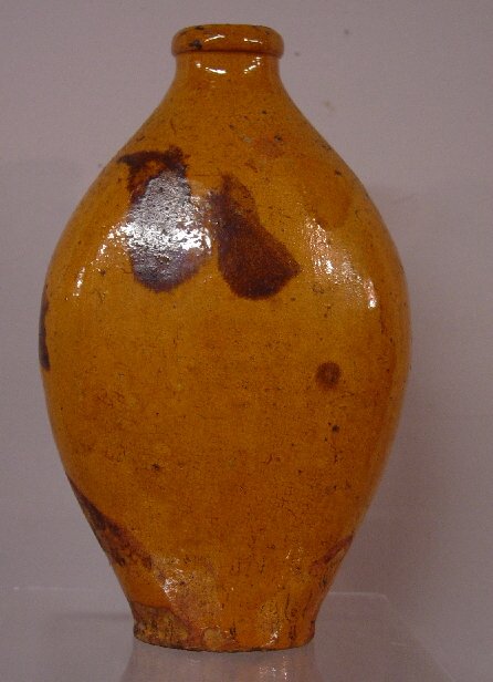 TWO REDWARE FLASKS. Both have dark brown