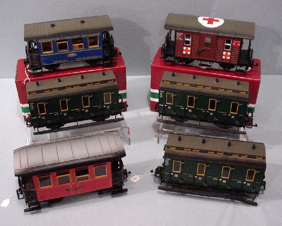 SIX LGB G SCALE PIECES. Two cabooses (3707 and 30: SIX LGB G SCALE PIECES. Two cabooses (3707 and 3013) and a medic car (41390). And three third-class passenger cars (3050). All in original boxes.