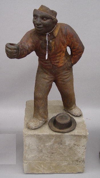 CAST IRON JOCKEY HITCHING POST. Thick cast iron wi