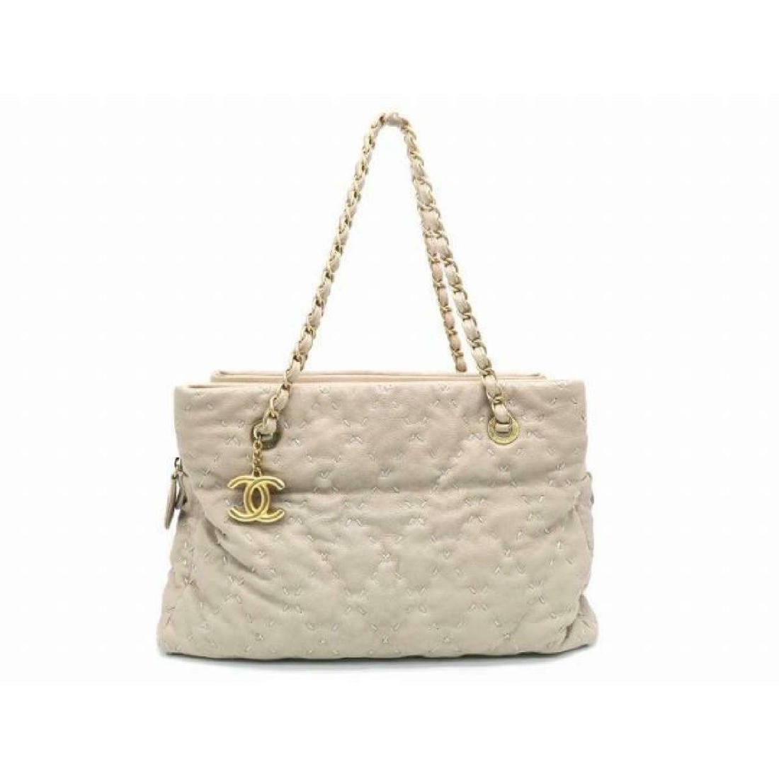 CHANEL SHOULDER BAG: Brand: Chanel Style: Shoulder Bag Metal: Calfskin Leather Bag Height: 8.26 Bag Depth: 7.87 Bag Length: 14.56 All Bidhaus items come with an Authenticity Guarantee. Unless specified above, item does no