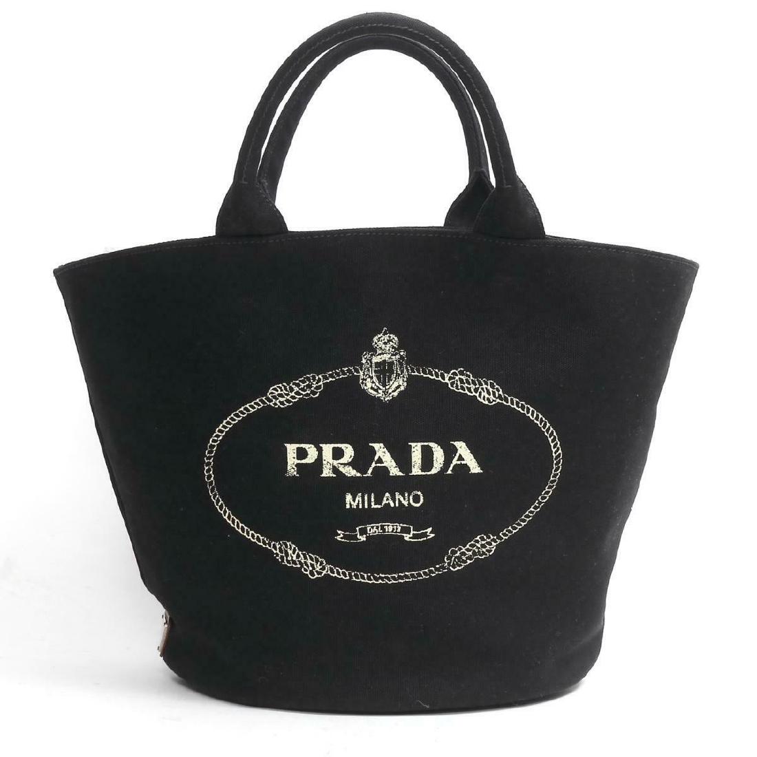 PRADA SHOULDER BAG: Brand: PRADA Style: Shoulder bag Color: Black Material: Canvas Country/Region of Manufacture: Italy Size: Medium Metal: Canvas/Leather Metal Purity: Unknown Bag Height: 11.81 Bag Depth: 7.87 Bag Lengt