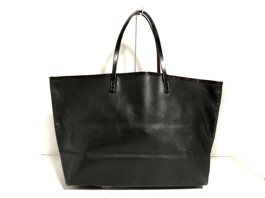 FENDI TOTE BAG: Brand: FENDI Style: Tote Bag Color: Black, DarkBrown Material: Leather Accessories: Dust Bag, Pouch (detachable) All Bidhaus items come with an Authenticity Guarantee. Unless specified above, item doe