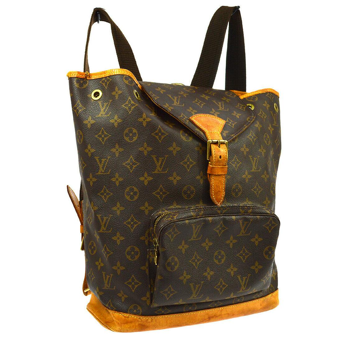 LOUIS VUITTON BACKPACK STYLE: Size: LargeAccents: LogoModel: MonogramModified Item: NoCountry/Region of Manufacture: FranceHandle/Strap Material: Canvas,LeatherStyle: Backpack StyleLining Color: BrownInside Pockets: 1Outside Pocke