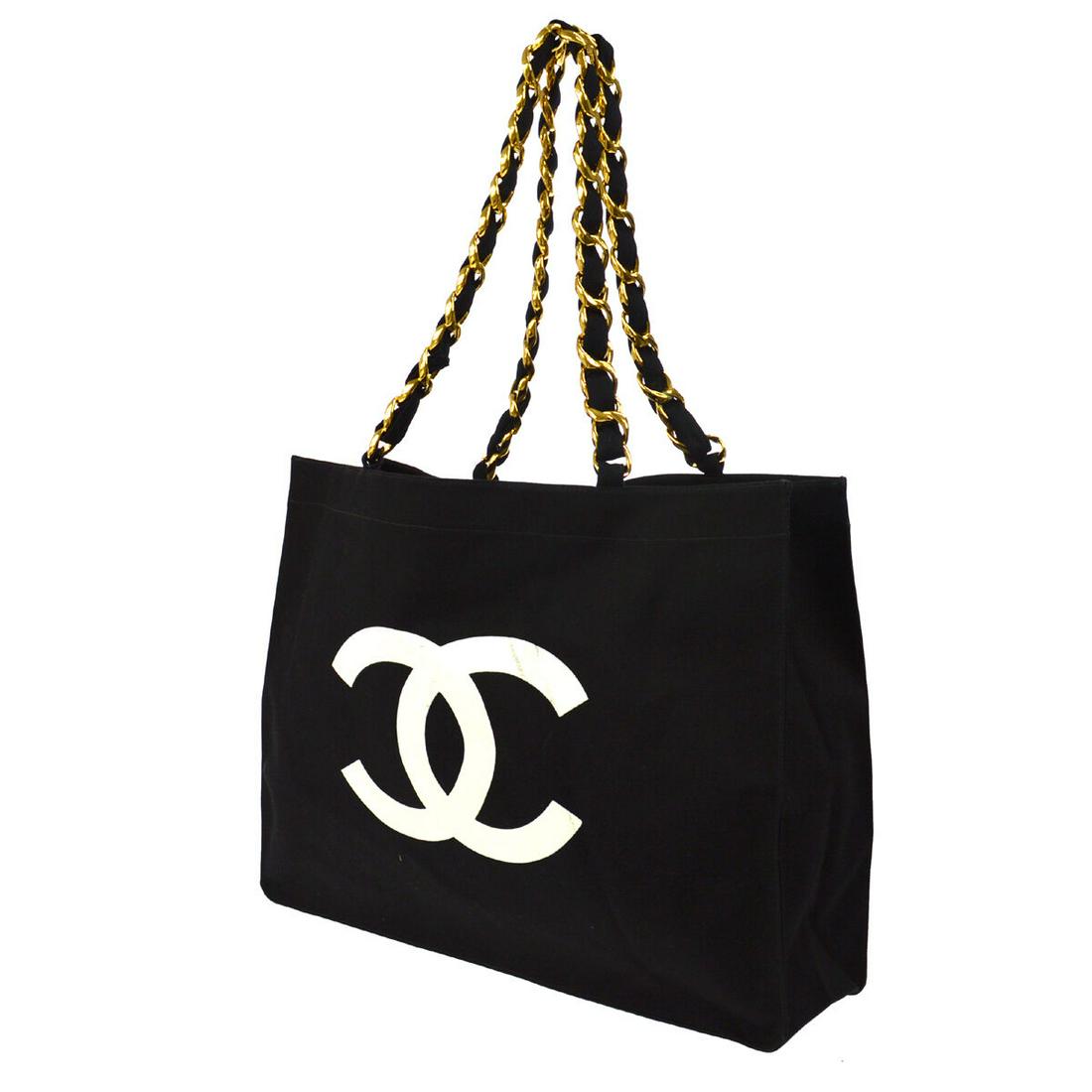 CHANEL SHOULDER BAG: Brand: CHANELStyle: Shoulder BagMaterial: CanvasColor: BlackBag Height: 12.2Bag Depth: 3.9Bag Length: 15.7Strap Drop: 9.8Size: LargeCountry/Region of Manufacture: FranceAll Bidhaus items come with an 