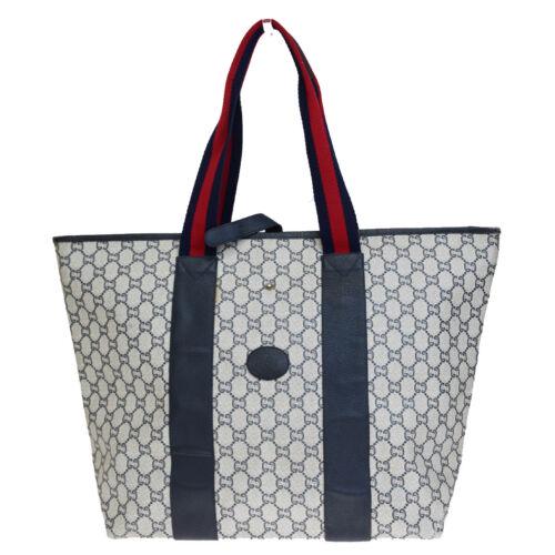 Gucci Tote Bag: Brand: Gucci Size: Large Style: Shoulder Bag Bag Height: 13.0 Material: Leather, PVC Bag Depth: 6.3 Color: Navy Blue Bag Length: 13.0 Country of Manufacture: Italy