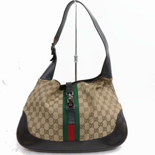 Gucci Shoulder Bag: Brand: Gucci Style: Shoulder Bag Material: Canvas Color: Brown Size: Medium Width: 13.7 inch(approx) /35 cm(approx) Height: 9.84 inch(approx) /25 cm(approx) Depth: 1.96 inch(approx) /5 cm(approx) C