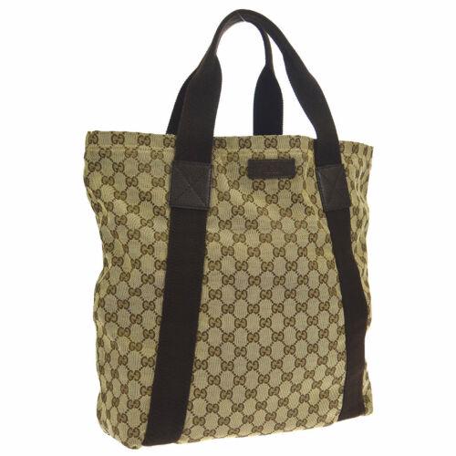 GUCCI Tote: Brand: GUCCI Style: Tote Material: Canvas, Leather Color: Brown Size: Large Width: 13.4 Height: 14.6 Depth: 5.1 Country of Origin: Italy Comes With: All Bidhaus items come with a 100% mone