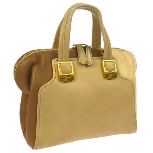 FENDI Hand Bag: Brand: FENDI Style: Hand Bag Material: Leather Color: Beige, Brown Size: Medium Width: 9.4 Height: 8.3 Depth: 4.7 Country of Origin: Italy Comes With: All Bidhaus items come with a 100% mo