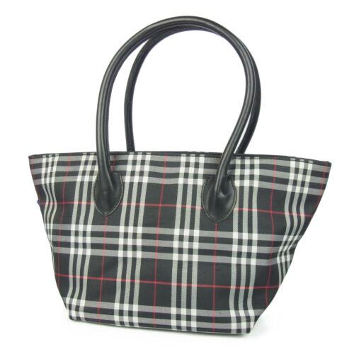 BURBERRY Tote: Brand: BURBERRY BLUE LABEL Style: Tote Material: Nylon, Leather Color: Black, Grey, Red Size: Medium Width: 7.7-14.5 Height: 7.9 Depth: 6.3 Country of Origin: Japan Comes With: