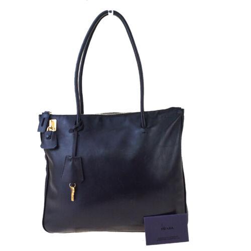 PRADA MILANO Logo Shoulder Bag: Brand: PRADA Style: Shoulder Bag Material: Leather Color: Black Size: Medium Width: 11.8 Height: 10.6 Depth: 2.8 Country of Origin: Comes With: All Bidhaus items come with a 100% money-back authenti