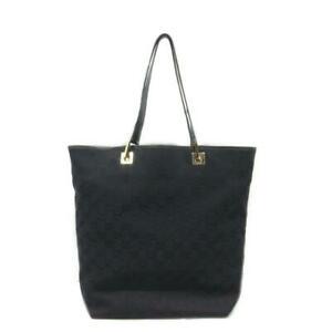 Gucci Tote Bag: Brand: Gucci Style: Tote Bag Material: Canvas Color: Black Size: Medium Width: 11.81 Height: 12.2 Depth: 4.33 Strap Drop: 7.87 Country of Origin: Italy Comes With: All Bidhaus i
