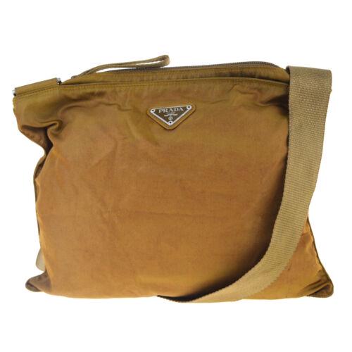 PRADA MILANO Cross Body Shoulder Bag: Brand: PRADA Style: Shoulder Bag Material: Nylon,Leather Color: Brown Size: Medium Width: Height: Depth: Country of Origin: Italy Comes With: All Bidhaus items come with a 100% money-back authenticity