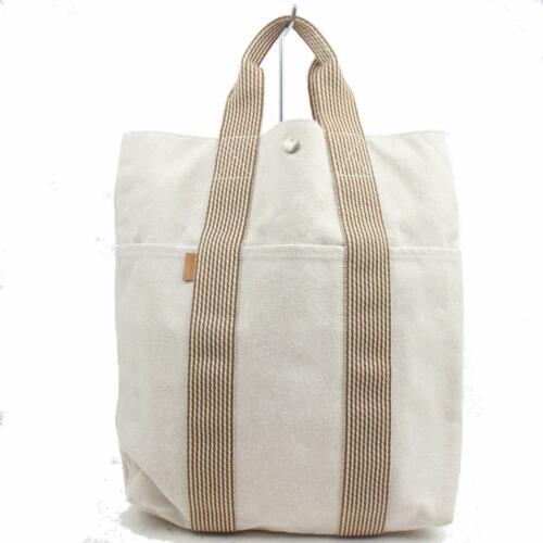 Hermes Tote: Brand: Hermes Style: Tote Bag Material: Canvas Color: Beiges Size: Width: 11.4 inch(approx) /29 cm(approx) Height: 13.7 inch(approx) /35 cm(approx) Depth: 3.14 inch(approx) /8 cm(approx) Country of Or