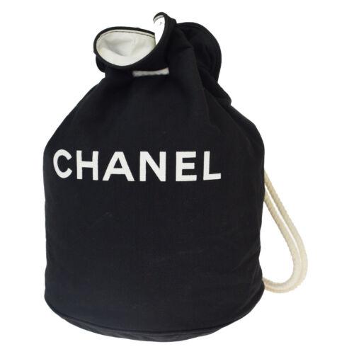 CHANEL Logo Drawstring shoulder: Brand: CHANEL Style: Shoulder Bag Material: Canvas Color: Black Size: Width: Height: 15 Depth: 9.8 Country of Origin: Medium Comes With: All Bidhaus items come with a 100% money-back authenticity guar