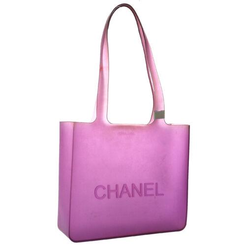 Authentic Chanel Shoulder Bag: Brand: CHANEL Style: Shoulder Tote Bag Material: Rubber Color: Purple Size: Medium Width: 9.4 Height: 8.3 Depth: 9.1 Country of Origin: France Comes With: Authenticity Seal, Authenticity Card, Shop Se