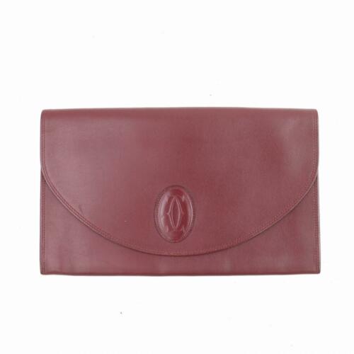 Authentic Cartier Clutch: Brand: Cartier Style: Clutch Material: Leather Color: Bordeaux Size: Width: 10.4 inch(approx) /26.5 cm(approx) Height: 6.29 inch(approx) /16 cm(approx) Depth: 0.39 inch(approx) /1 cm(approx) Country o