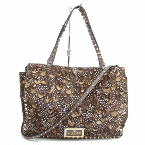 Authentic Valentino Shoulder Bag Rockstud: Brand: Valentino Style: Material: Unborn Calf Color: Browns Size: Shoulder (inch) Width: Height: 9.05 inch(approx) /23 cm(approx) Depth: 5.11 inch(approx) /13 cm(approx) Strap Drop: 12.2 inch(appr