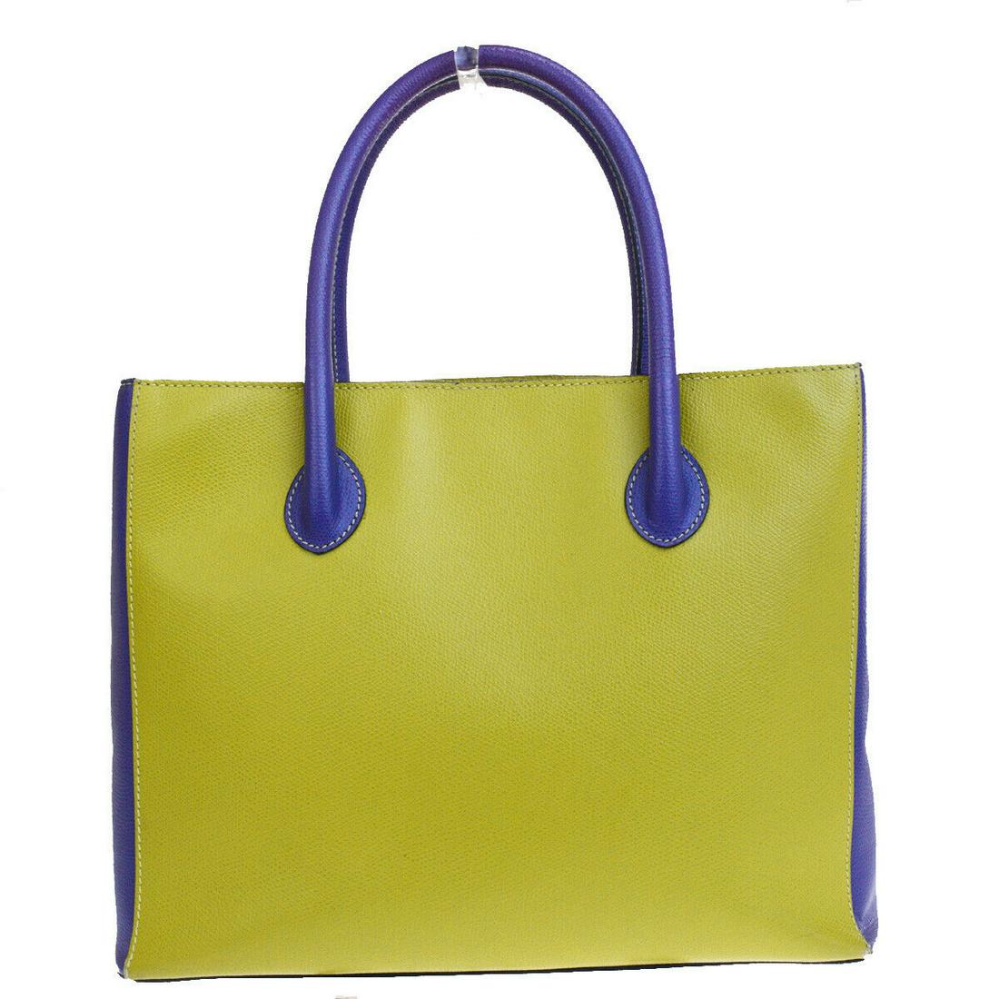 Authentic Celine Leather Hand Bag: Brand: Celine Style: Hand Bag Material: PVC Leather Color: Green Purple Size: Medium Size (Inches): W 12.2 x H 9.4 x D 3.9 "(approx.) Strap Drop: 5.1 Country of Origin: Italy Comes With: All Bidhaus i