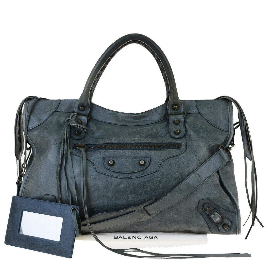 Authentic Balenciaga Leather Shoulder Hand Bag: Brand: BALENCIAGA Style: Shoulder Hand Bag Material: Leather Color: Gray Size: Medium Size (Inches): W 14.6 x H 9.4 x D 4.7 "(approx.) Strap Drop: 6.3 Country of Origin: Italy Comes With: All Bidhaus 