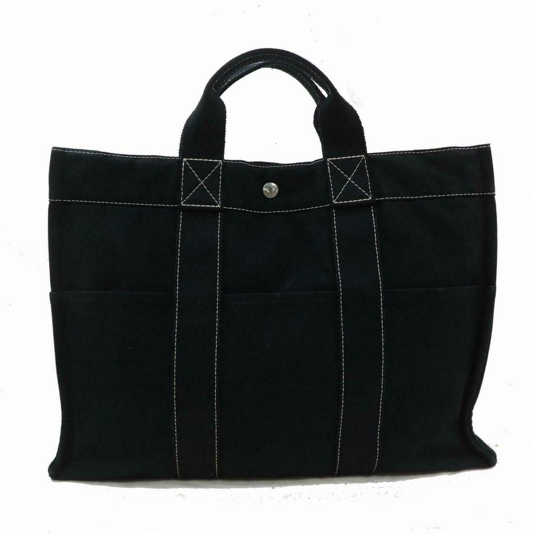 Authentic Hermes Canvas Tote Bag: Brand: Hermes Style: Tote Bag Material: Canvas Color: Black Size: Height: 12.5 inch(approx) /32 cm(approx) Depth: 3.93 inch(approx) /10 cm(approx) Width: 16.5 inch(approx) /42 cm(approx) Comes With: A