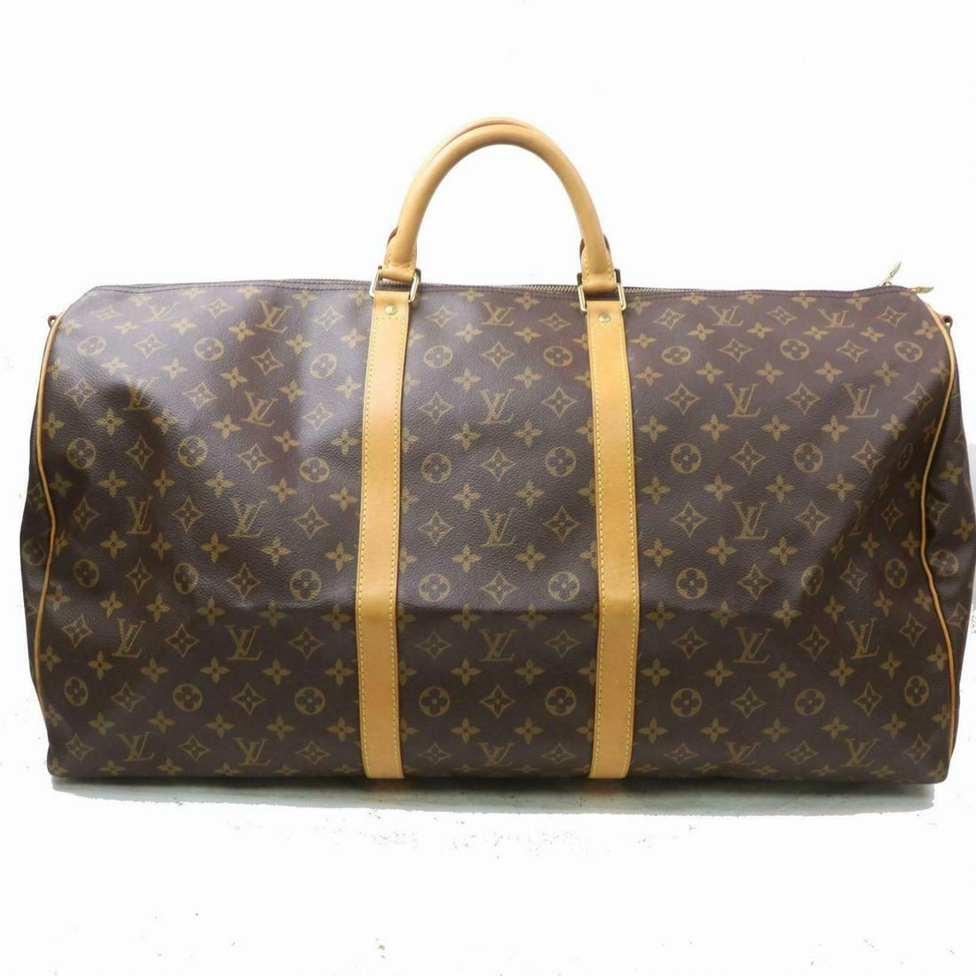 Authentic Louis Vuitton Monogram Boston Bag: Brand: Louis Vuitton Style: Boston Bag Material: Monogram Color: Browns Height: 12.9 inch(approx) /33 cm(approx) Depth: 10.2 inch(approx) /26 cm(approx) Width: 23.6 inch(approx) /60 cm(approx) All Bid