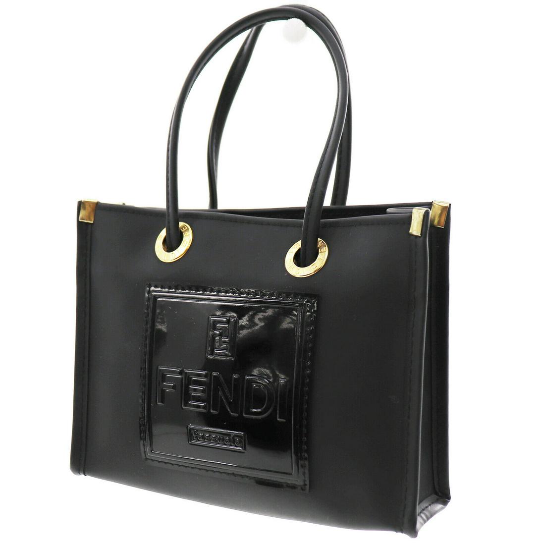 Authentic Fendi Pouch: Brand: Fendi Style: Pouch Material: Color: Black Size: Mini Country of Origin: Unknown All Bidhaus items come with a 100% money-back authenticity guarantee. Please refer to images carefully for condit