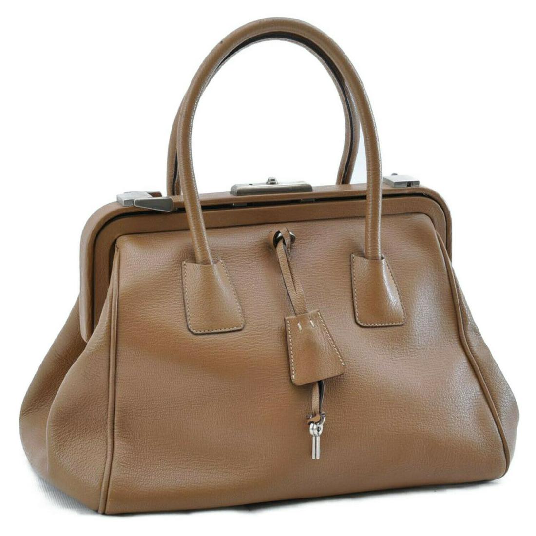 Authentic Prada Leather Hand Bag: Brand: PRADA Style: Hand Bag Material: Leather Color: Beige Size (Inches): W12.59 x H7.87 x D7.48inch(Approx) Country of Origin: Italy Exterior Condition: Leather : lose shape, wrinkle, rubbing, dirt,