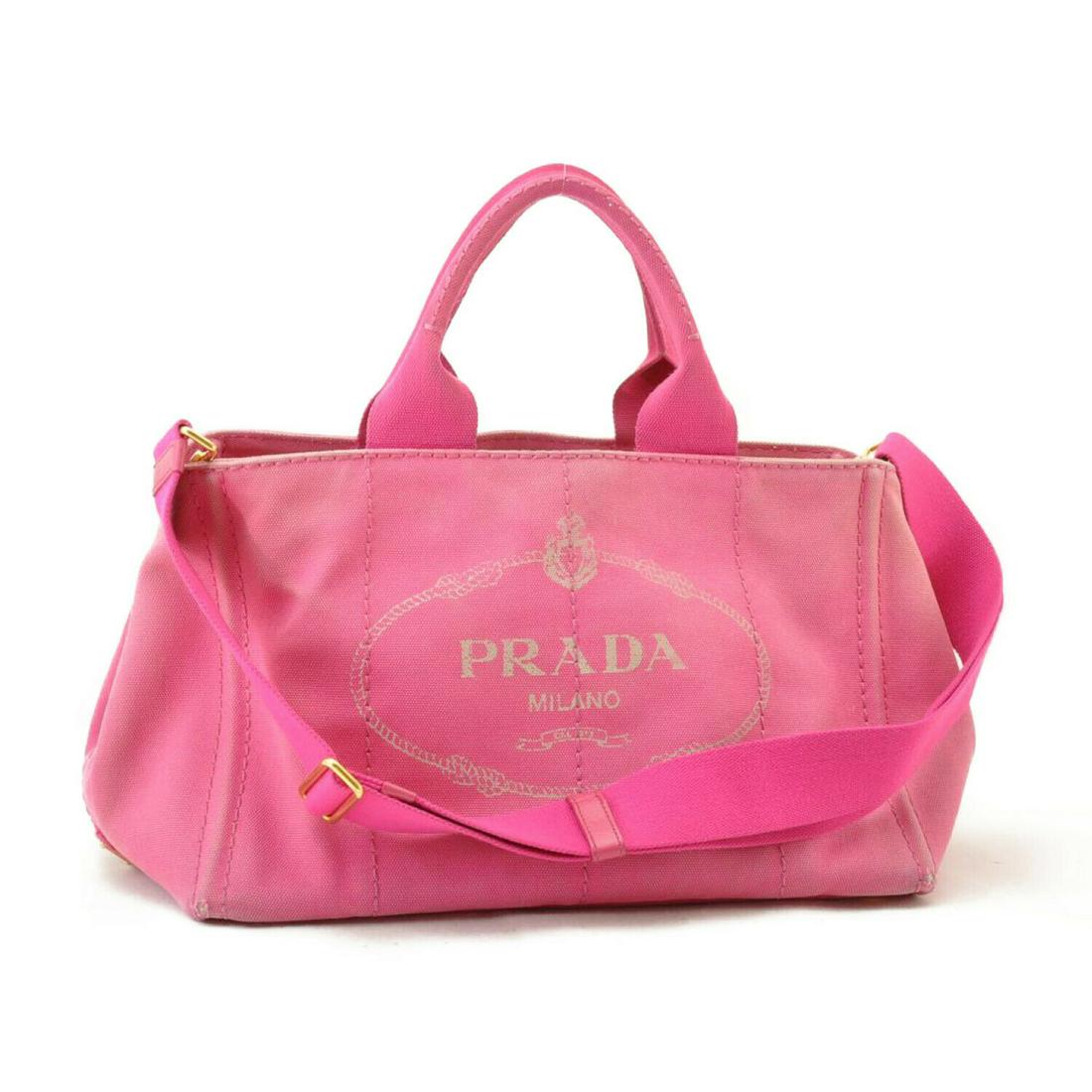 Authentic Prada Canvas Hand Bag: Brand: PRADA Style: Hand Bag Material: Canvas Color: Pink Size (Inches): W13.38 x H7.48 x D8.66inch / Shoulder Drop 11.02-22.04â€³(Approx) Country of Origin: Italy Exterior Condition: Canvas : sli