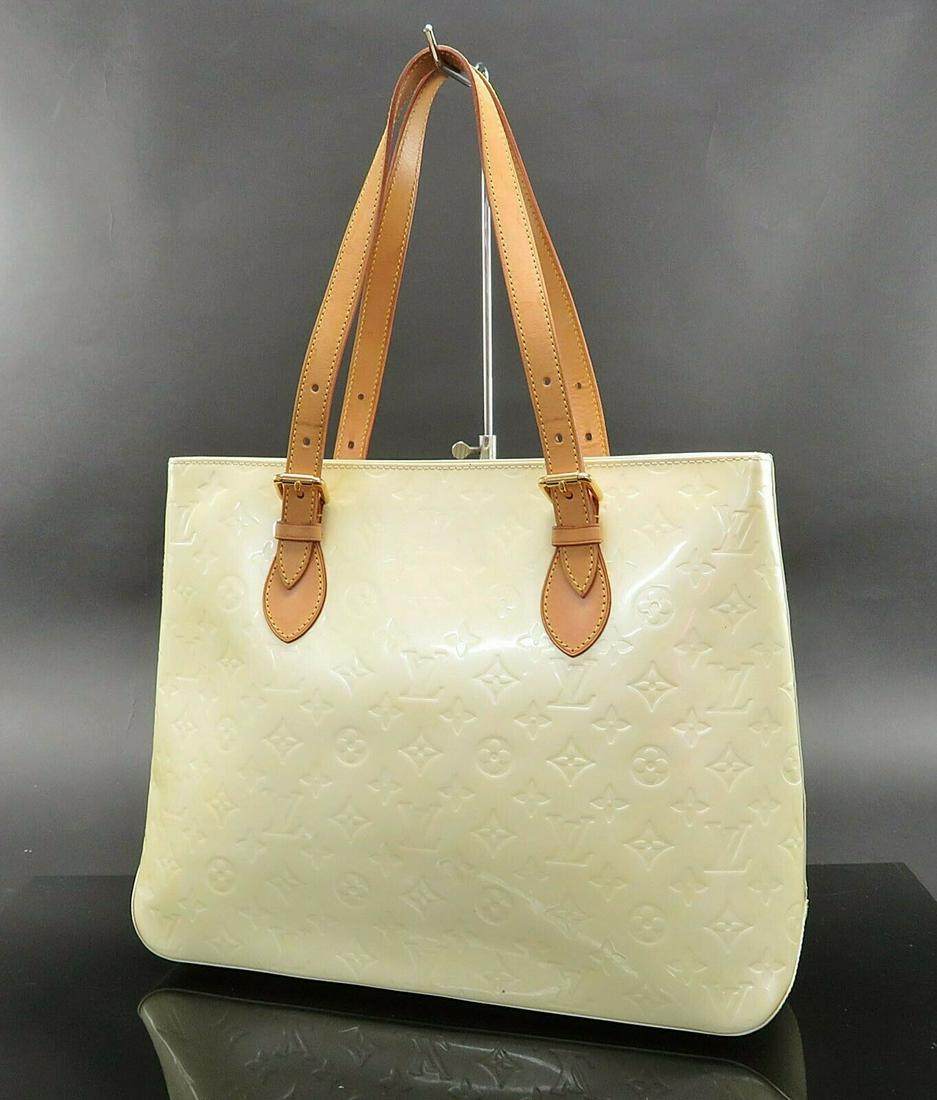 Authentic Louis Vuitton Patent Leather Totes & Shoppers: Brand: Louis Vuitton Style: Totes & Shoppers Material: Patent Leather Color: White Comes With: Vernis care booklet and materials card. Country of Origin: Adjustable from 5.9 to 7.8 All Bidhaus items c