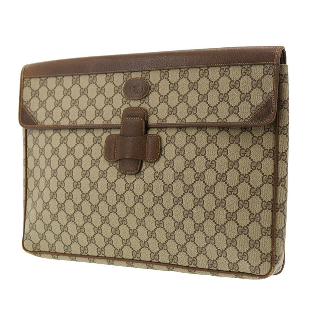 Authentic Gucci Brown Pvc Leather: Brand: Gucci Material: PVC Leather Color: Brown Size: H 11.8 x D 1.5 x L 15.9 Made In: Italy Comes with: - All Bidhaus items come with a 100% money-back authenticity guarantee. Please refer to images 