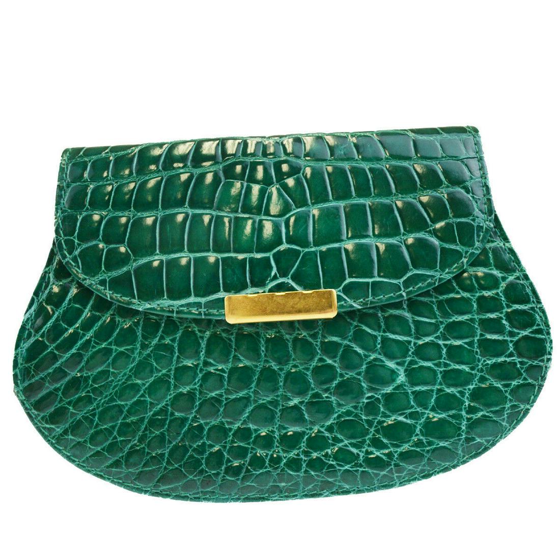 Authentic Christian Dior Green Clutch Hand Bag: Brand: Christian Dior Style: Clutch Hand Bag Material: Crocodile Skin Leather Color: Green Size: Small All Bidhaus items come with a 100% money-back authenticity guarantee. Please refer to images care