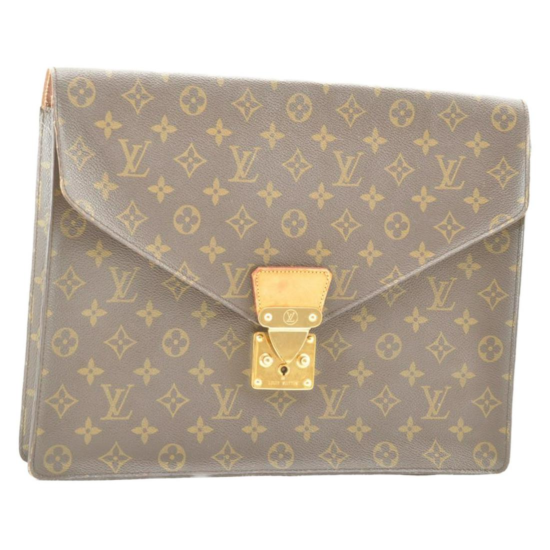 Authentic Louis Vuitton Monogram Canvas Brief Case: Brand: LOUIS VUITTON Style: Brief case Color/Material: Monogram Size (Inches): W14.9 x H11 x D1.7"(Approx) Comes With: There is no item box and dust bag. We will send only the item which is put in the
