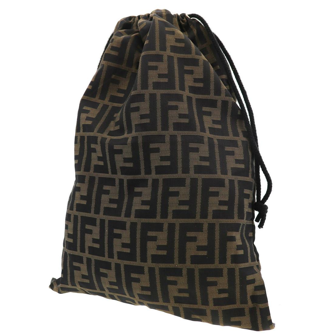 Authentic Fendi Nylon Canvas Drawstring Bag: Brand: Fendi Material: Nylon Canvas Style: Drawstring Bag Color: Brown Black Size(Inch): H 15.7 x D 0.1 x L 11.8 Country of Origin: Italy All Bidhaus items come with a 100% money-back authenticity gua