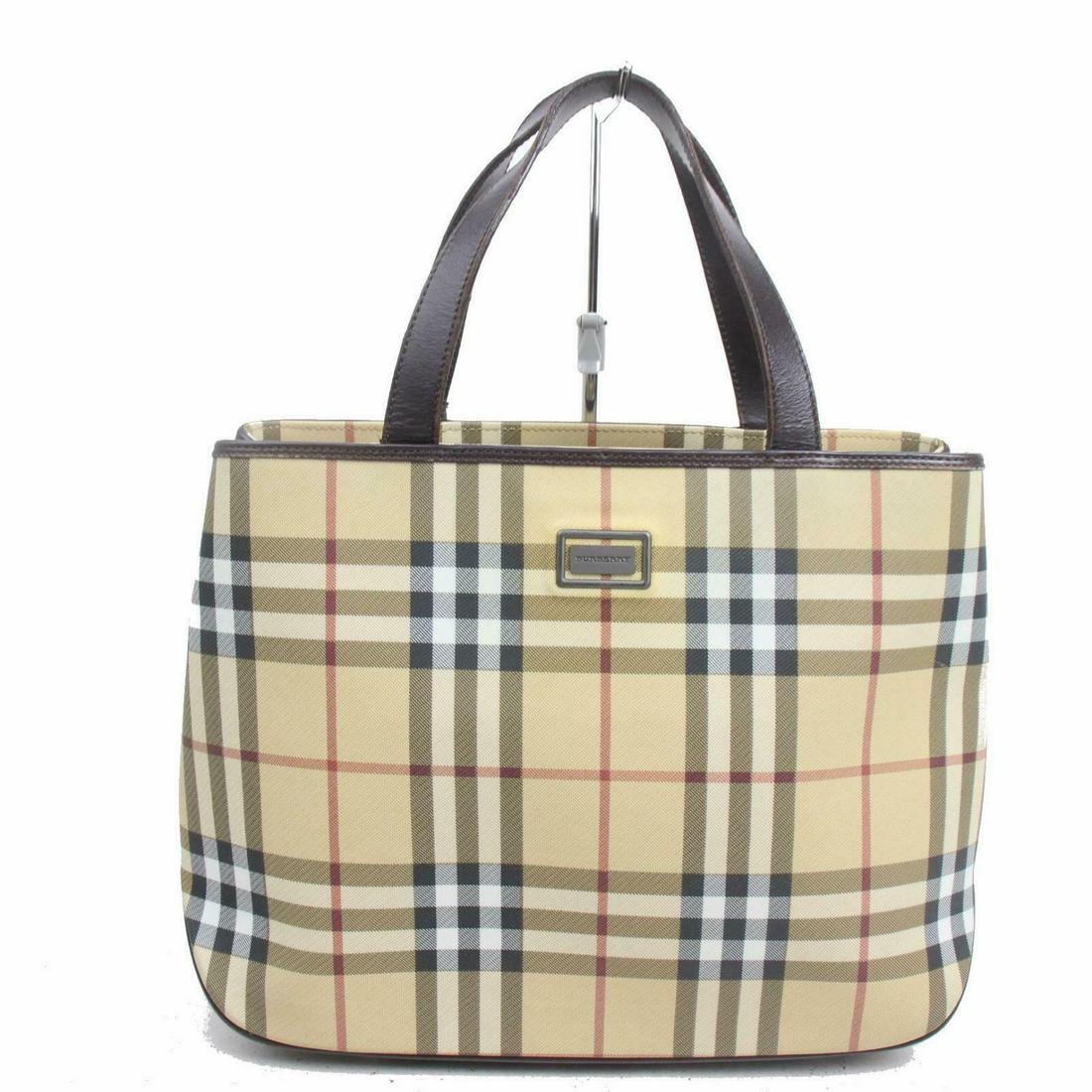Burberry London Tote Bag Light Brown PVC 1: Brand: Burberry London Style: Tote Bag Material: PVC Height (Inches): 9.44 inch(approx) /24 cm(approx) Depth (Inches): 4.33 inch(approx) /11 cm(approx) Width (Inches): 13.3 inch(approx) /34 cm(approx)