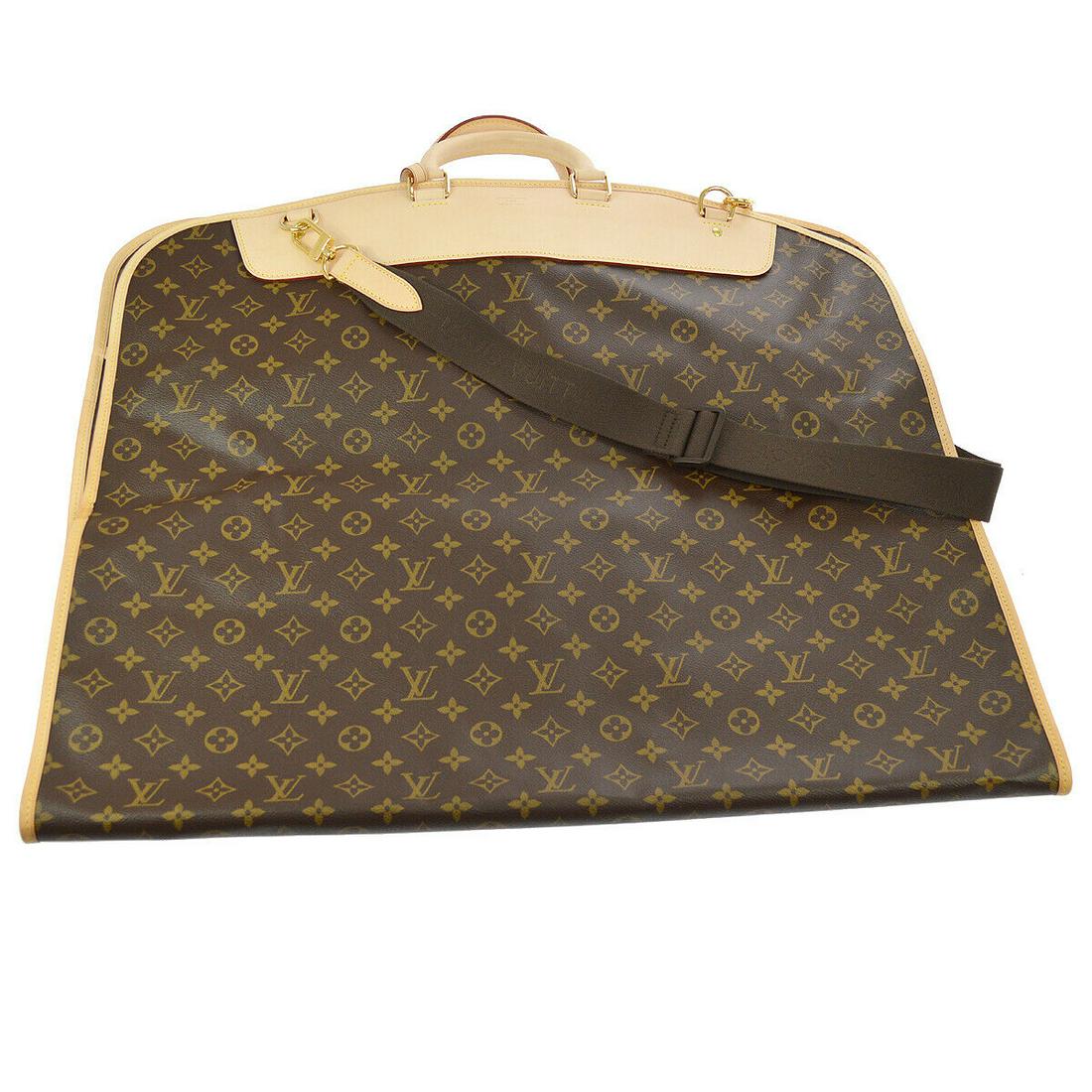 Authentic Louis Vuitton Monogram Canvas, Leather: Brand: Louis Vuitton Material: Monogram Canvas, Leather Style: Garment Cover Color: Brown Country of Origin: France All Bidhaus items come with a 100% money-back authenticity guarantee. Please refer t