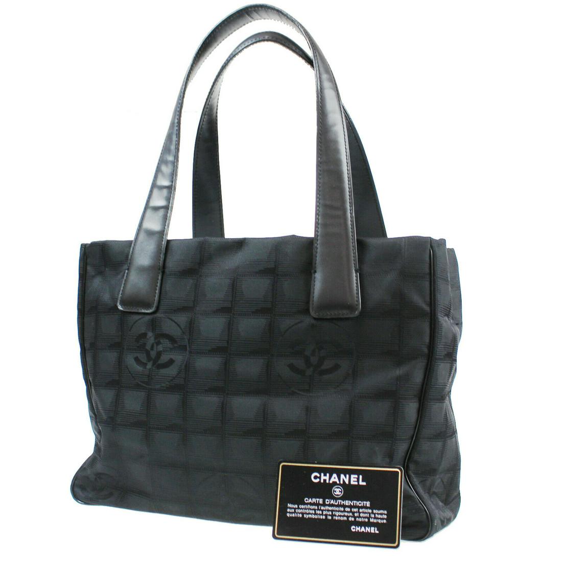Authentic CHANEL Nylon Leather Tote Bag: Brand: CHANEL Material: Nylon Leather Style: Tote Bag Color: Black Size(Inch): H 8.6 x D 4.3 x L 11.0 Handle: 18.1 Country of Origin: Italy All Bidhaus items come with a 100% money-back authenticity g